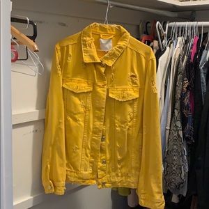 Distressed yellow jean jacket